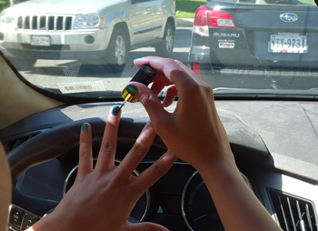 Polishing nails while driving