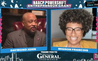 Daymond John congratulates Mignon Francois of Cupcake Collection for winning NAACP grant sponsored by The General