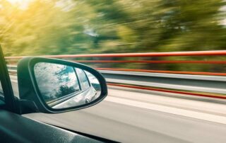 Car Insurance Lapse - Car driving on road