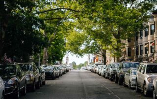 how to parallel park - street lined with cars parallel parked