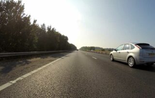 Do you need insurance to drive someone else's car - car on road