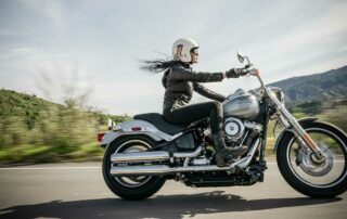 Do you need motorcycle insurance - woman riding motorcycle