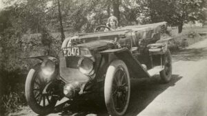 Florence Lawrence behind the wheel of a Lozier open touring car - Photo from Wisconsin Center for Film and Theater Research