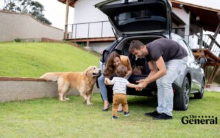 Happy family spending time together on a road trip with peace of mind Umbrella Insurance